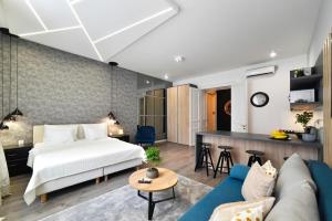Posteľ alebo postele v izbe v ubytovaní Time Apartments Downtown