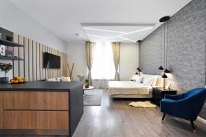 Posteľ alebo postele v izbe v ubytovaní Time Apartments Downtown