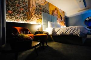 Postel nebo postele na pokoji v ubytování Hotel Viktorosa