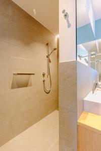 a bathroom with a shower and a sink at La Villetta 17 in Lana