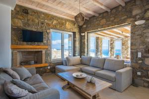 A seating area at Natural Stone Villas
