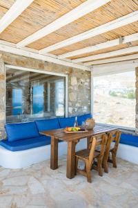 A seating area at Natural Stone Villas