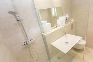 Koupelna v ubytování Hotel Cesario