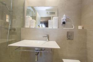 Koupelna v ubytování Hotel Cesario