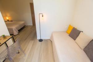 Postel nebo postele na pokoji v ubytování Hotel Cesario