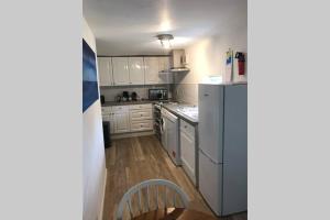 Kuchyň nebo kuchyňský kout v ubytování Coach House + 19 fotografií