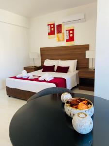 Кровать или кровати в номере Eleonora Hotel Apartments