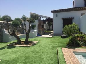 Ein Garten an der Unterkunft Casa Ananda y Casa Rengue