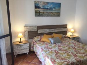 Ein Bett oder Betten in einem Zimmer der Unterkunft Casa Ananda y Casa Rengue