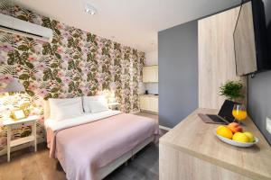 Posteľ alebo postele v izbe v ubytovaní Time Apartments Downtown