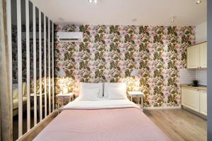 Posteľ alebo postele v izbe v ubytovaní Time Apartments Downtown