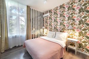 Posteľ alebo postele v izbe v ubytovaní Time Apartments Downtown