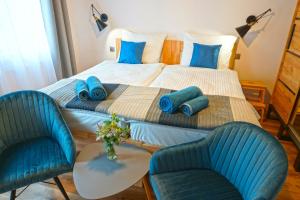 Letto o letti in una camera di MALINOWA OSADA