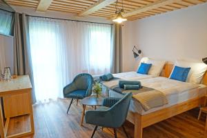 Letto o letti in una camera di MALINOWA OSADA