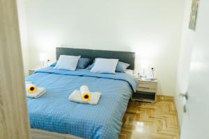 Uma cama ou camas num quarto em Sunflower