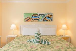 Ein Bett oder Betten in einem Zimmer der Unterkunft Key West Villas