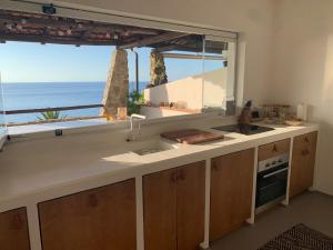 Kuchyňa alebo kuchynka v ubytovaní Boutique apartment with beach within walking distance, near Tropea