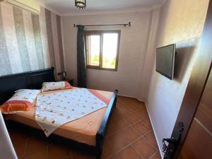 Giường trong phòng chung tại Cabo Dream Vacances
