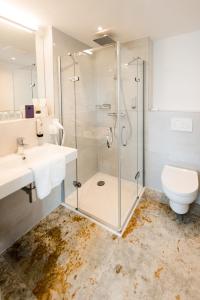 Koupelna v ubytování HAIMHAUSERS Hotel Garni