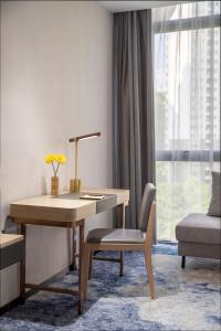 Posezení v ubytování Paco Hotel Jinfeng Metro Guangzhou-Free Shuttle Bus For Canton Fair-Self-service laundry