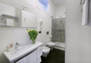 Kúpeľňa v ubytovaní Borgo Pio Suites Inn