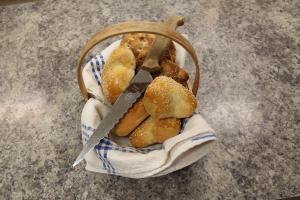 a basket of pastries sitting on top of a table at Trunna Vandrarhem & Konferens in Orsa +72 photos