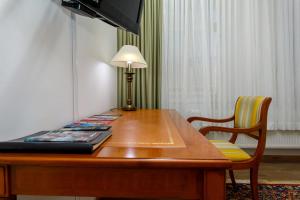 TV a/nebo společenská místnost v ubytování Stylové ubytování v historickém centru Litomyšle