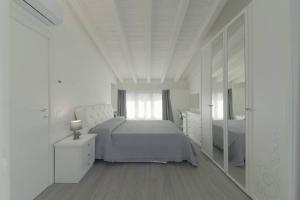 Villa Joy - Luxury chalet tesisinde bir odada yatak veya yataklar