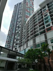 a large tall building with a lot of windows at I-City Shah Alam @Home 1 in Shah Alam