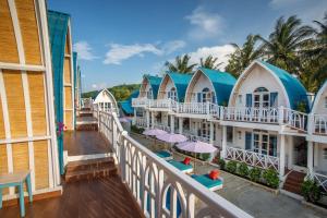 a view from the balcony of a resort at Santorini Beach Resort in Gili Trawangan
