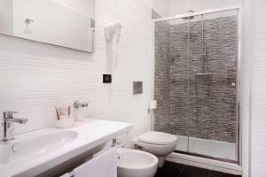 Kúpeľňa v ubytovaní Borgo Pio Suites Inn + 36 fotografií