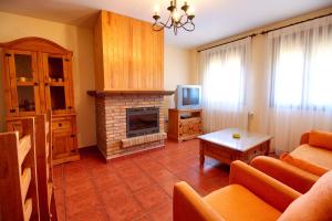 A television and/or entertainment centre at El Mirador de la Serrania