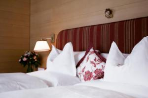 Posteľ alebo postele v izbe v ubytovaní Hotel Angela