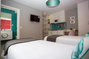 Letto o letti in una camera di Chic Studios