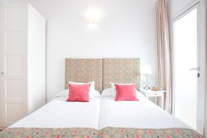 Posteľ alebo postele v izbe v ubytovaní Genteel Home Zaragoza
