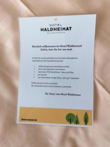 ein Menü für eine hoteleigene Malibu-Anwendung in der Unterkunft Hotel Waldheimat in Gallneukirchen