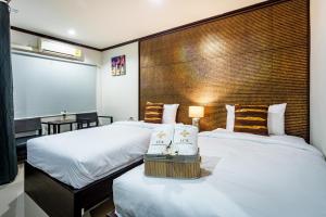 Postel nebo postele na pokoji v ubytování Lux Boutique Hotel