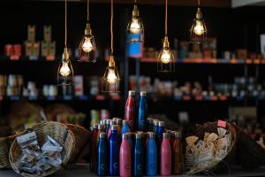 a table with two baskets and lights at C Mauritius in Belle Mare
