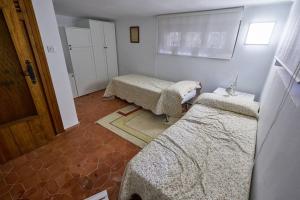 Ein Bett oder Betten in einem Zimmer der Unterkunft Casa Peña Guardavistas