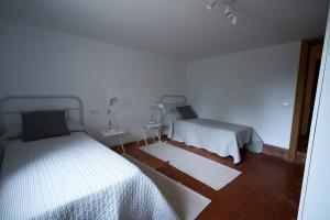 Ein Bett oder Betten in einem Zimmer der Unterkunft Casa Peña Guardavistas