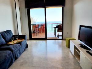 Telewizja i/lub zestaw kina domowego w obiekcie Carvajal Seaviews