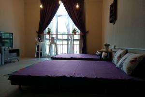 Katil atau katil-katil dalam bilik di LOVE LODGE BRINCHANG, CAMERON HIGHLANDS