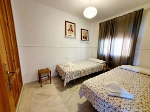 Łóżko lub łóżka w pokoju w obiekcie Carvajal Seaviews