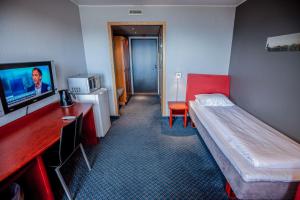 TV a/nebo společenská místnost v ubytování F2 Hotel