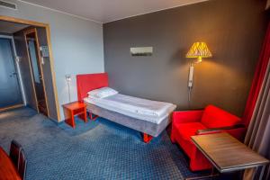 Postel nebo postele na pokoji v ubytování F2 Hotel