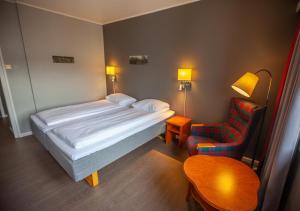 Postel nebo postele na pokoji v ubytování F2 Hotel
