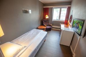 Postel nebo postele na pokoji v ubytování F2 Hotel