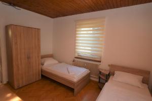Ένα ή περισσότερα κρεβάτια σε δωμάτιο στο Apartment Nürtingen Zentrum +6 φωτογραφίες