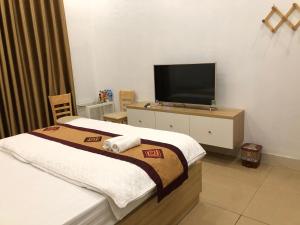 TV a/nebo společenská místnost v ubytování Nàng Hương Motel