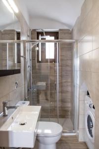 Kylpyhuone majoituspaikassa Amousso Beach Villas